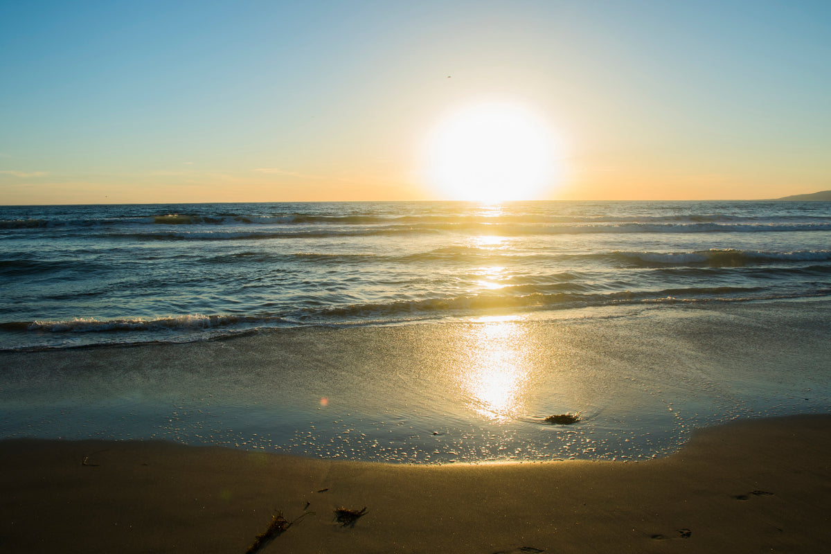 PLAGE-AVEC-SOLEIL-COUCHANT